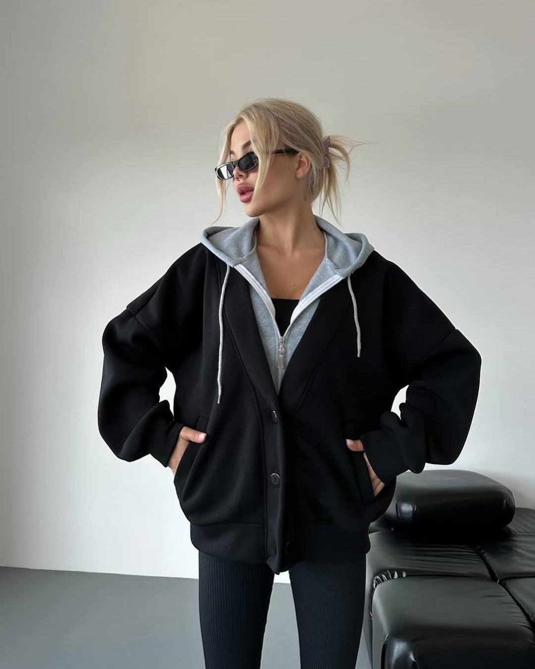 Damen Oversized Kapuzenjacke mit Druckknopfverschluss und Eingrifftaschen Echoarchiv
