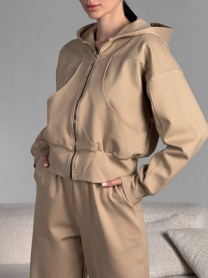 Damen kurz geschnittene Reißverschluss-Kapuzenjacke mit überschnittener Schulter, tiefen Eingrifftaschen und elastischem Bund – Auréline