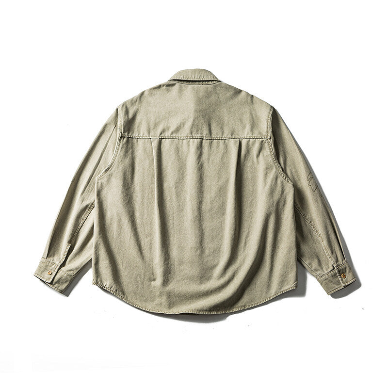 Unisex Oversize Hemdjacke mit gestickten Blattmotiven und abgerundetem Saum Echoarchiv