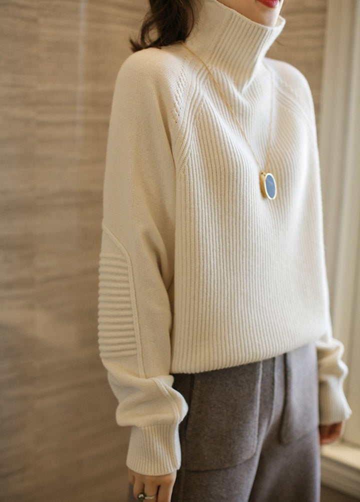 Damen Rollkragenpullover aus feinem Rippstrick mit Raglanärmeln und legerer Silhouette Echoarchiv