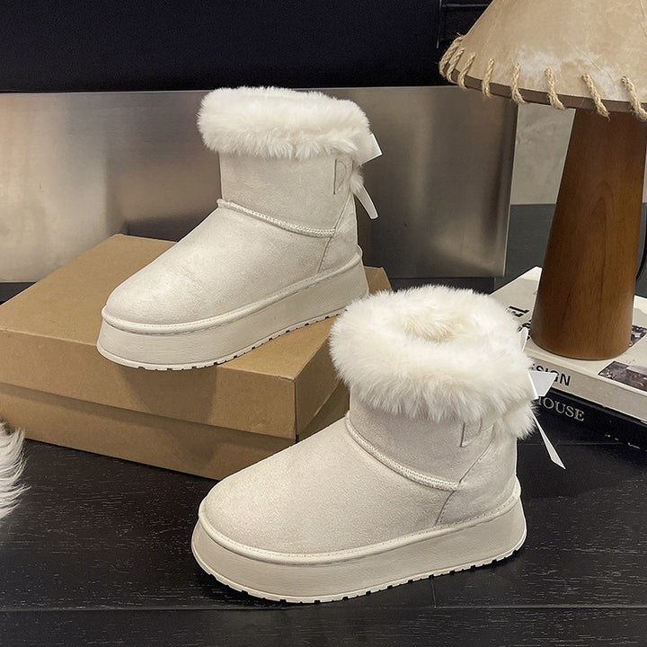 Damen Gefütterte Kurzstiefel mit Kunstfell-Bündchen, rutschfester Plateausohle und Schleifendetail Echo Archiv