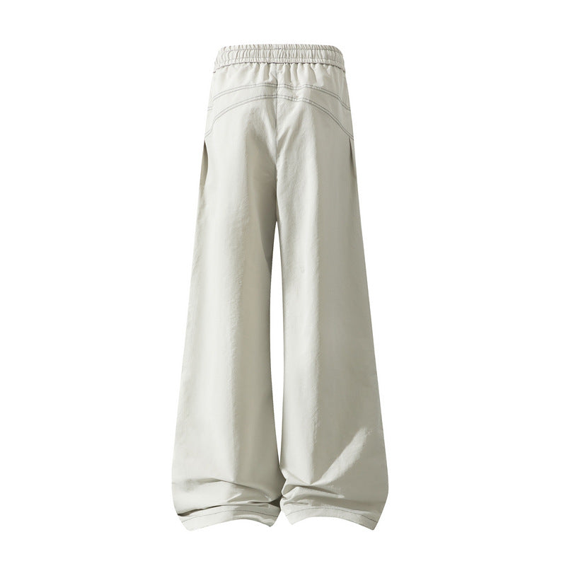 Herren Weite Cargo‑Hose mit Tunnelzugbund, Utility‑Nähten und Reißverschluss‑Taschen Echo Archiv