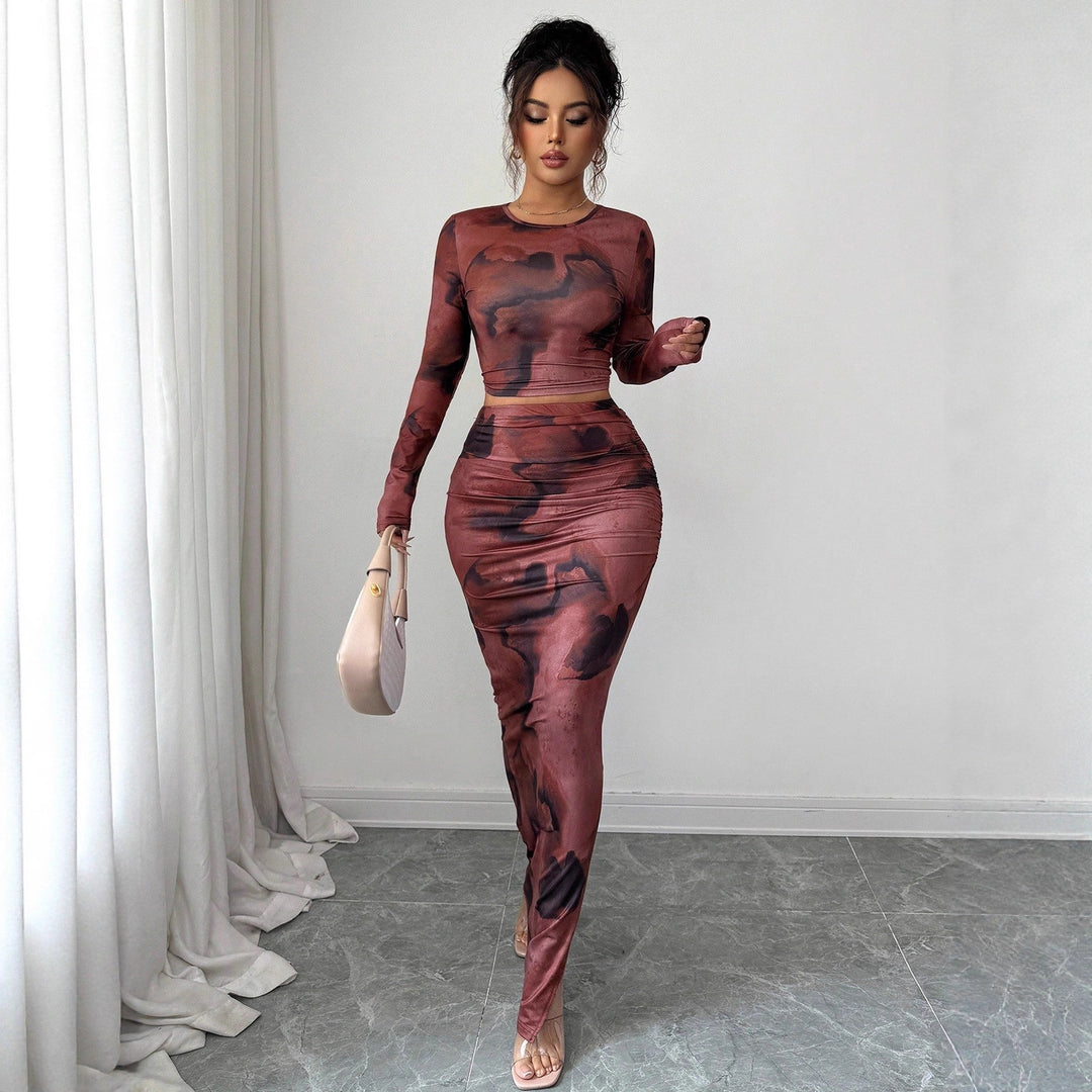 Damen nan zweiteiliges figurbetontes Set aus elastischem Mesh mit langärmligem Crop-Top, Daumenloch und gerafftem Midirock Echo Archiv