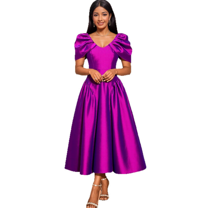 Damen elegantes Midikleid mit voluminösen Puffärmeln und schwingendem Rock Echo Archiv