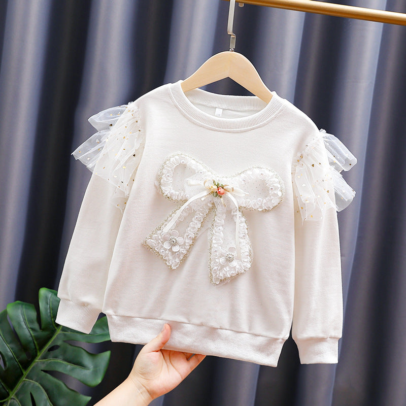 Mädchen modisches Sweatshirt mit transparenten Puffärmeln und Schleifendetail Echo Archiv