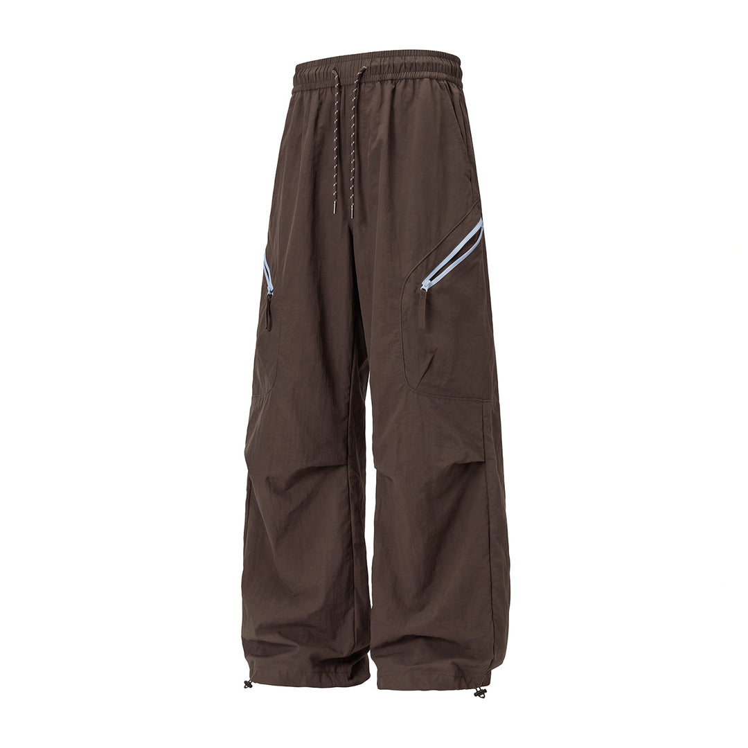 Unisex Weite Outdoor-Cargohose mit Kordelzugbund, schrägen Reißverschlusstaschen und verstellbarem Beinabschluss Echo Archiv