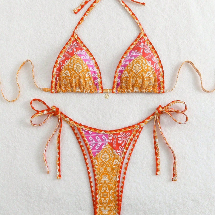 Damen Triangel-Bikini mit verspieltem Schnitt und exotischem Muster Echo Archiv
