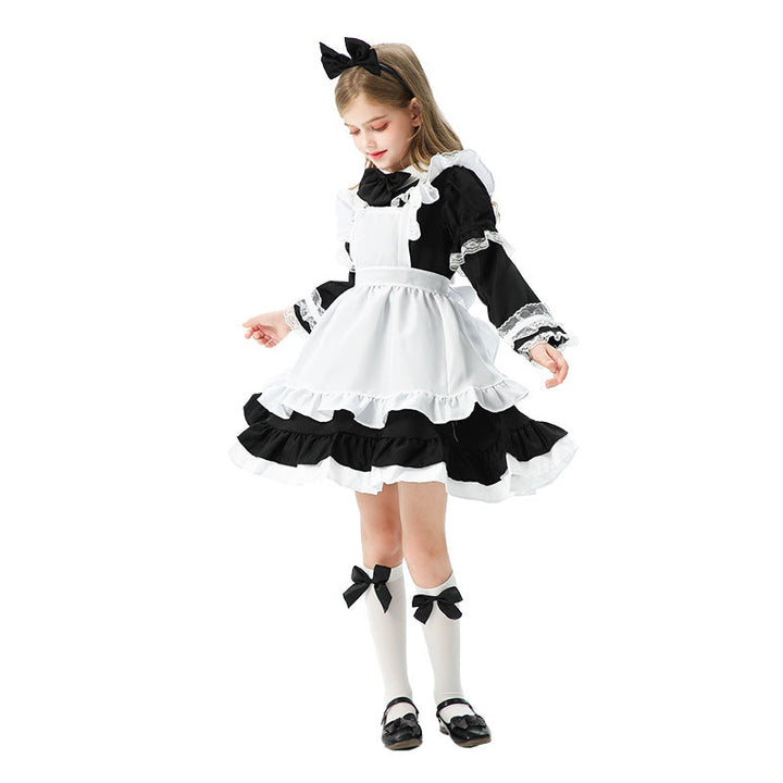 Mädchen verspieltes Dienstmädchenkleid mit Rüschendetails Echo Archiv