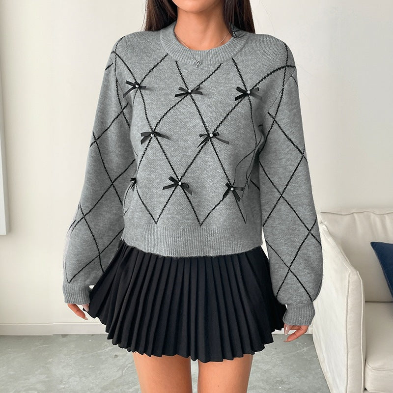 Damen Kurzer Argyle-Strickpullover mit Zier‑Schleifen und geripptem Saum Echoarchiv