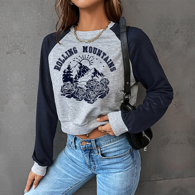 Damen Cropped Raglan-Sweatshirt mit Bergmotiv, Rippbündchen und lockerer Passform Echoarchiv