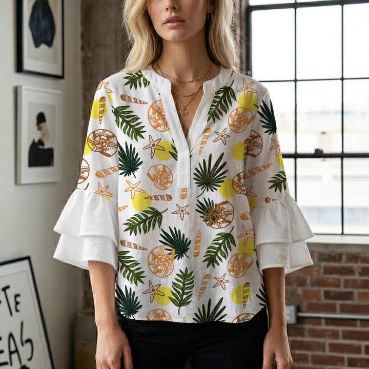Damen Bluse mit voluminösen Rüschenärmeln und modernem Motiv Echo Archiv