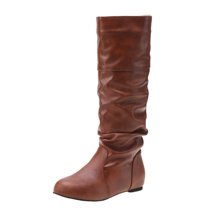 Damen Schlupfstiefel mit gerafftem Schaft und flacher Keilsohle – Varelle