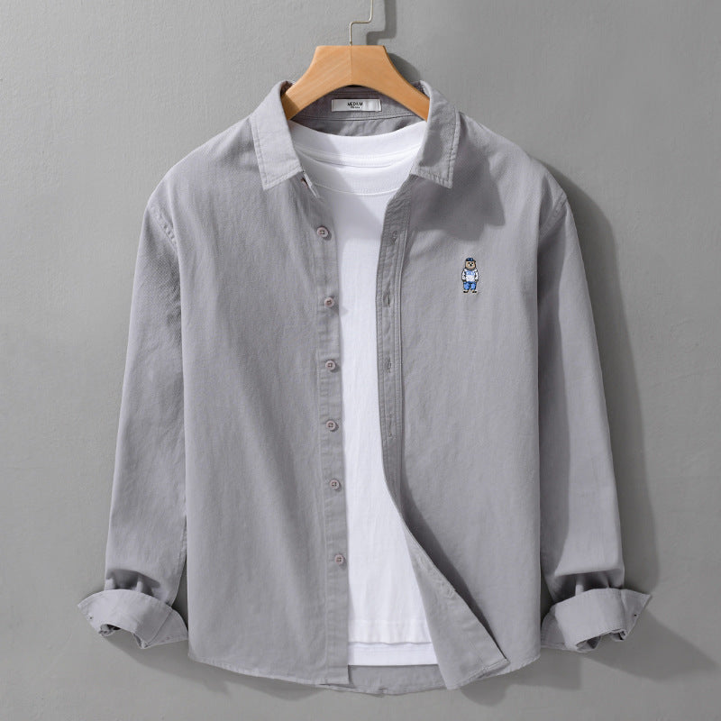 Herren Leichtes Hemd-Overshirt aus Baumwolltwill mit kleiner Figurenstickerei und kastigem Schnitt Echoarchiv