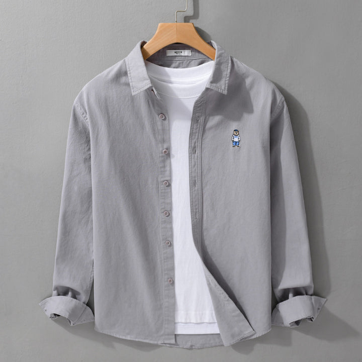 Herren Leichtes Hemd-Overshirt aus Baumwolltwill mit kleiner Figurenstickerei und kastigem Schnitt Echoarchiv