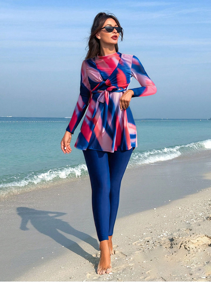 Damen modischer Strandanzug mit langen Ärmeln und femininem Wickeldetail Echo Archiv