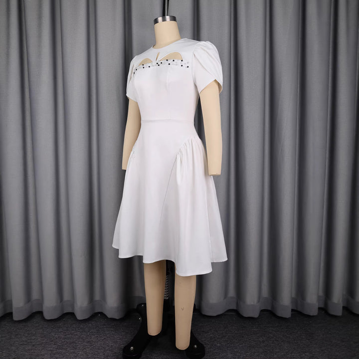 Damen Kleid mit eleganten Puffärmeln und raffinierten Cut-Outs Echo Archiv