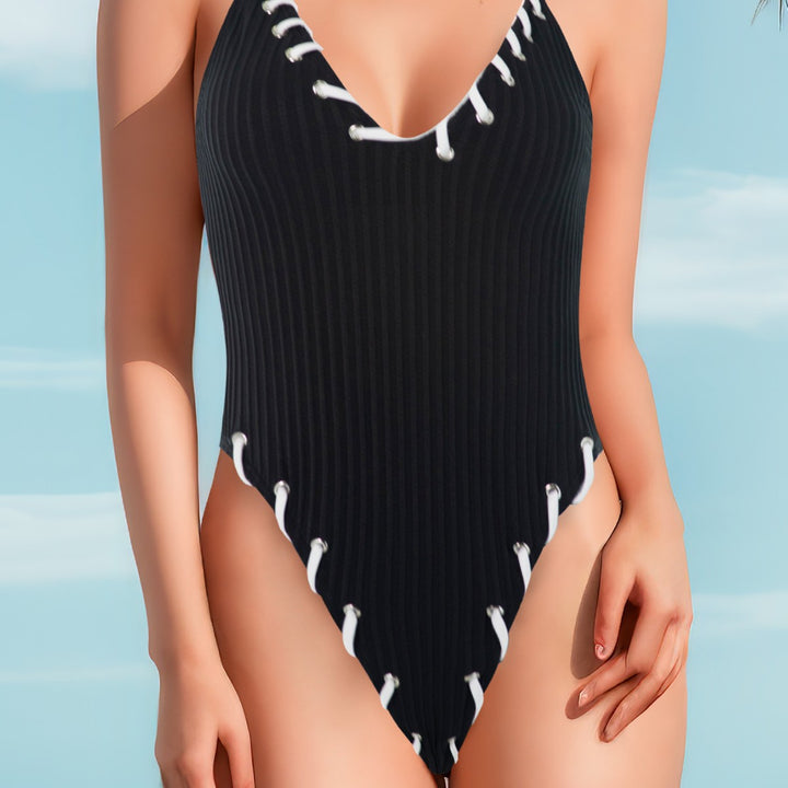 Damen Eleganter Einteiler mit raffinierten Schnürdetails Echo Archiv