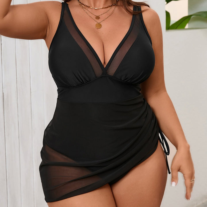 Damen Badeanzug mit elegantem Wickelrock und transparentem Oberteil Echo Archiv