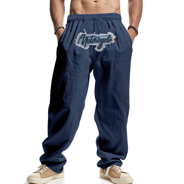 Herren Locker sitzende Leinenoptik-Relaxhose mit elastischem Bund, Kordelzug & Frontprint – Sorevano