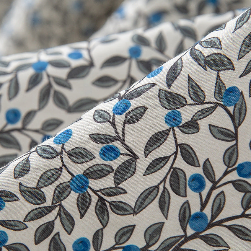 Damen Midirock mit Plissée‑Optik, gerafftem Bund und floralem Print Echoarchiv