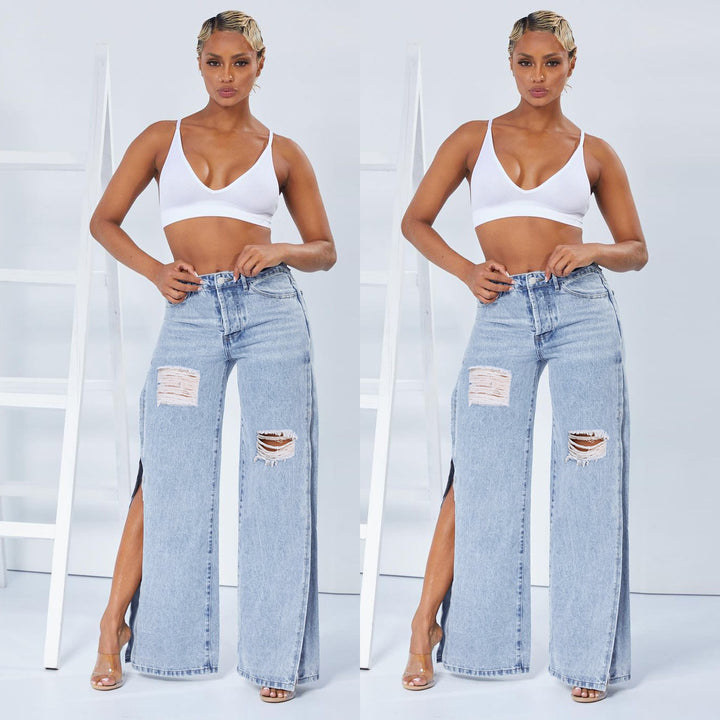Damen Weite High‑Waist Denim‑Jeans mit hohen Seitenschlitzen und Destroyed‑Details Echo Archiv