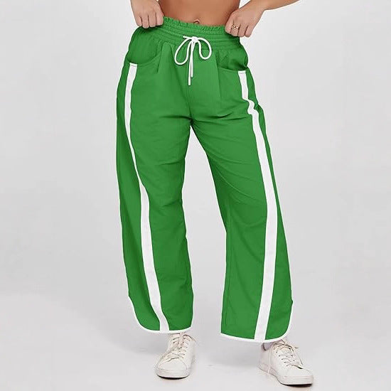 Damen relaxte Trackpants mit seitlichem Kontraststreifen, elastischem Smokbund und Eingrifftaschen – Avélisse