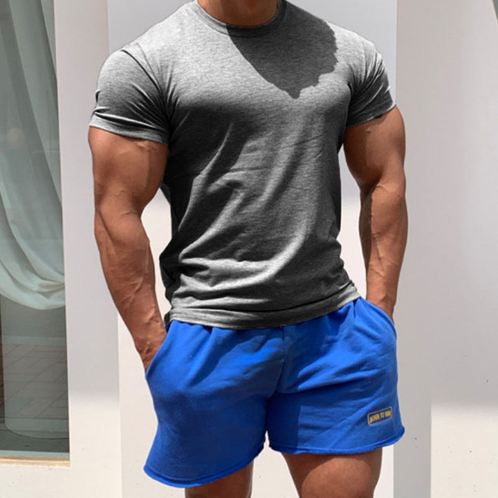 Herren körperbetontes Fitness-T-Shirt und kurze Sportshorts Set Echoarchiv