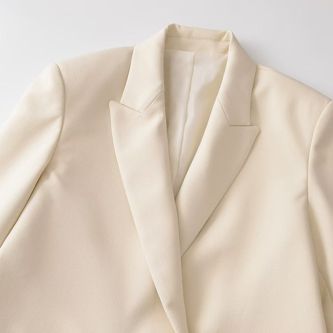 Damen Doppelreihiger Longblazer mit Reverskragen, tailliertem Schnitt und Pattentaschen Echoarchiv