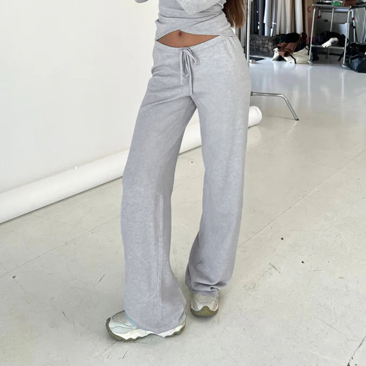 Damen nan Wickel-Cropped-Top mit tiefem V‑Ausschnitt, taillierter Wickelform und langen Glockenärmeln Echo Archiv
