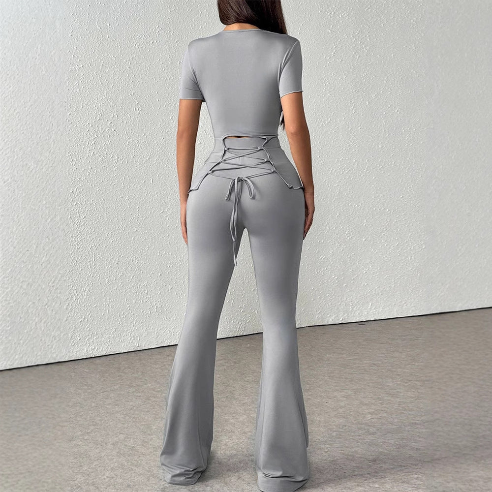 Damen elegantes Set aus figurbetontem Oberteil und ausgestellten Hosen Echo Archiv