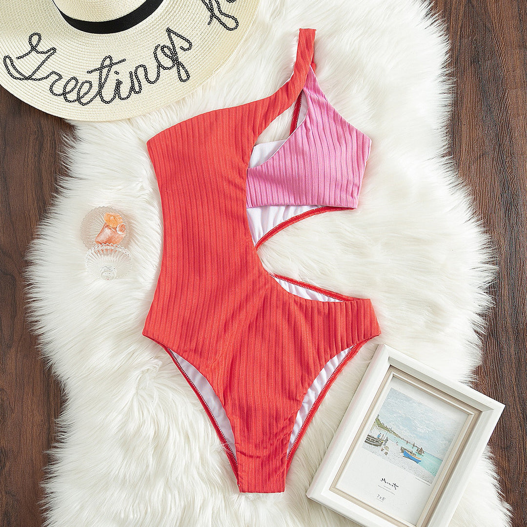 Damen Einteiler Badeanzug mit asymmetrischem Schnitt und modernen Cut-Outs Echo Archiv
