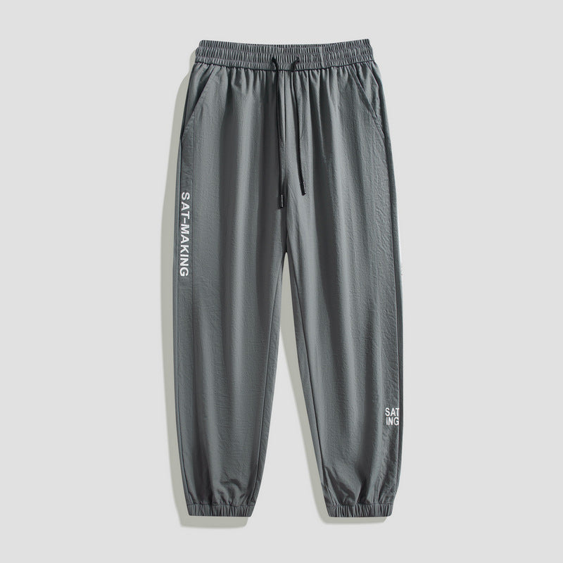 Herren Sportliche Jogginghose mit elastischem Bund und Reißverschlusstaschen Echo Archiv