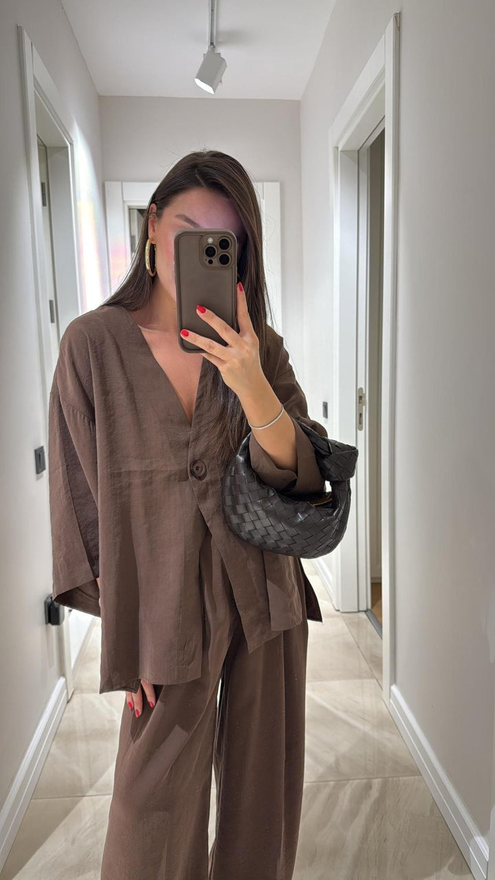 Damen nan entspanntes Zweiteiler-Leinenensemble mit kimonoartiger Oversize-Jacke und weiter Palazzohose Echo Archiv