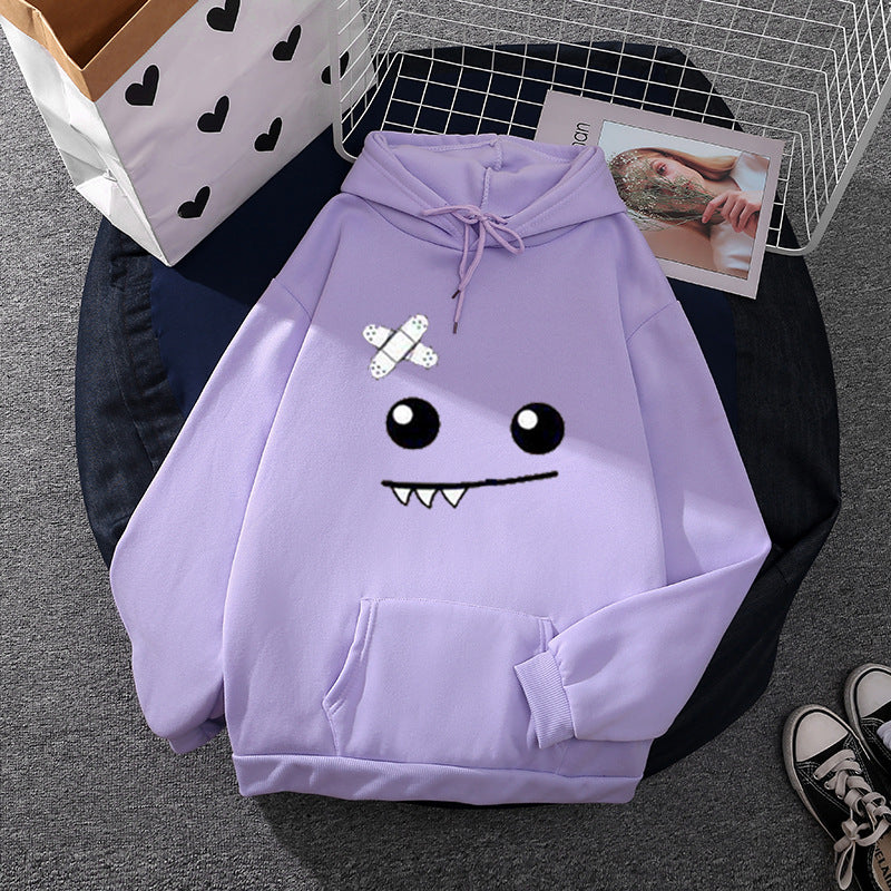 Damen Kapuzenpullover mit verspieltem Monstergesicht, Bandagen-Applikation und Kängurutasche – Auréline