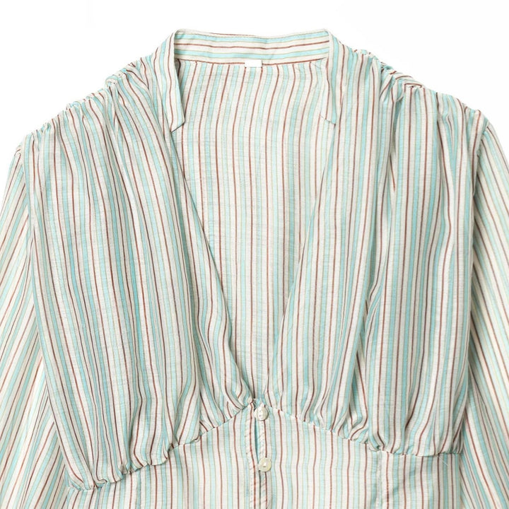 Damenbluse mit tiefem V-Ausschnitt und eleganten Rüschendetails Echo Archiv