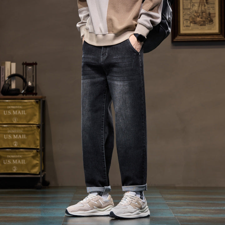 Herren Weite gerade geschnittene Denim-Jeans mit Used‑Wash und Umschlagbund Echoarchiv