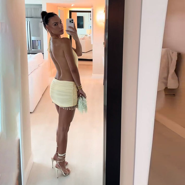Damen ärmelloses Minikleid mit Raffungen und eleganten Details Echo Archiv