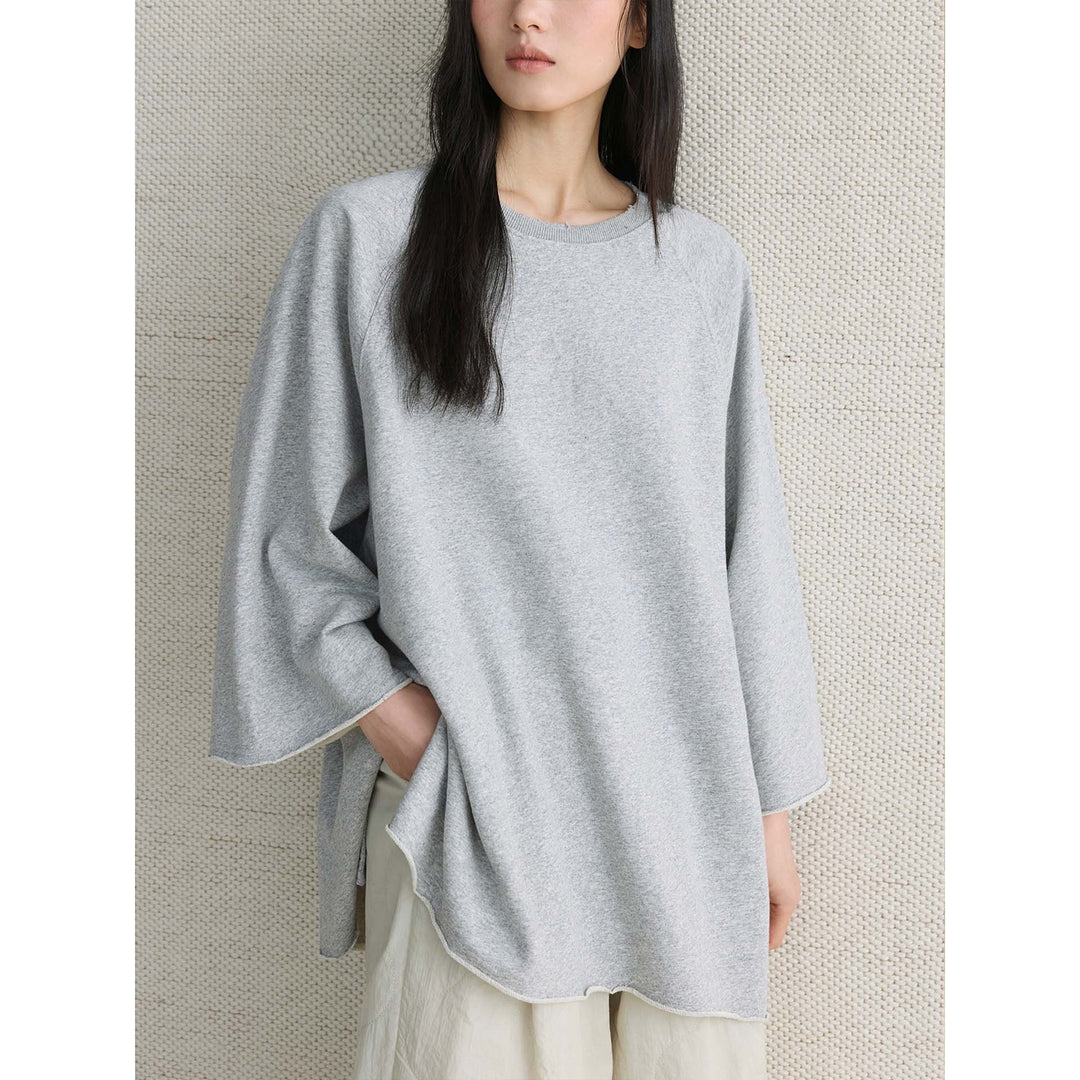 Damen Oversized Sweatshirt mit rohem Halsausschnitt und weiten Raglanärmeln Echoarchiv