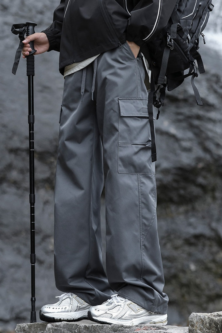 Herren Oversized Outdoor‑Cargohose mit Zugbund, großen Klapp‑ und Utility‑Taschen Echoarchiv