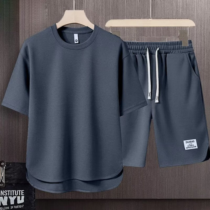 Unisex lässiges Set aus T-Shirt und Shorts mit seitlichen Taschen und elastischem Bund Echoarchiv