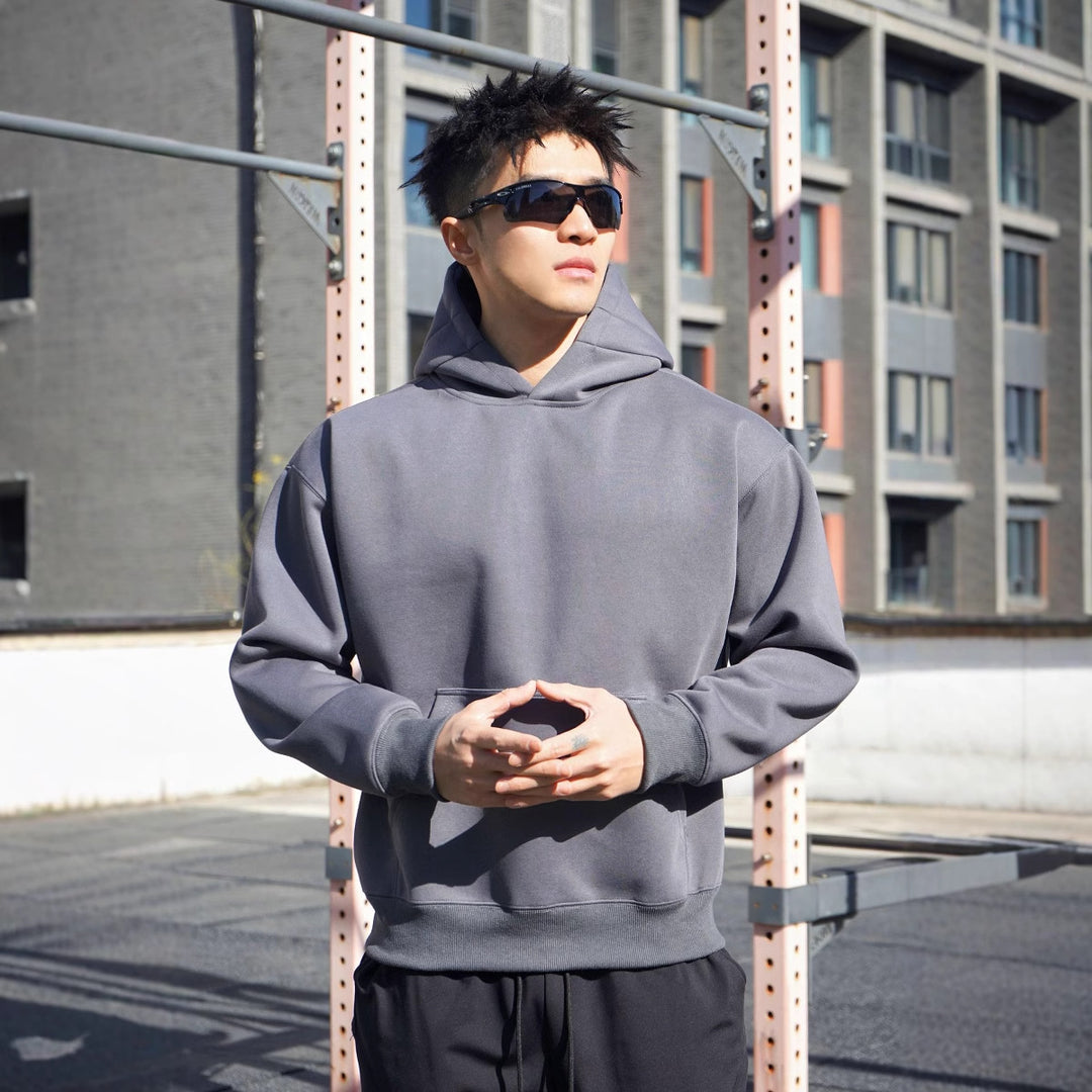 Herren Kapuzensweatshirt aus hochwertigem Baumwollmaterial mit modernem Oversized-Schnitt Echoarchiv