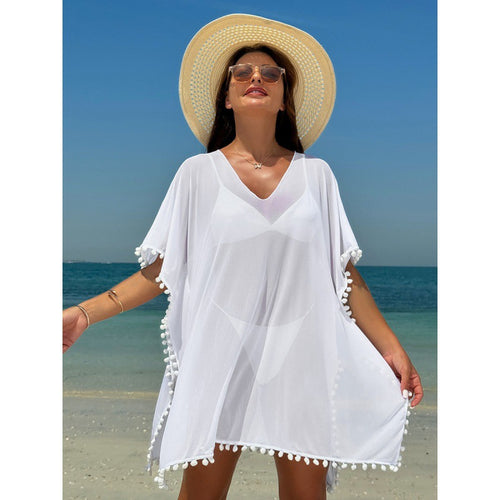 Damen Strandkleid mit dekorativem Pompon-Besatz und elegantem V-Ausschnitt Echo Archiv