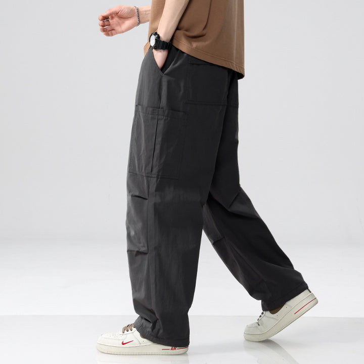 Herren Weite Cargohose im Utility‑Stil mit Kordelzug und aufgesetzten Beintaschen Echoarchiv