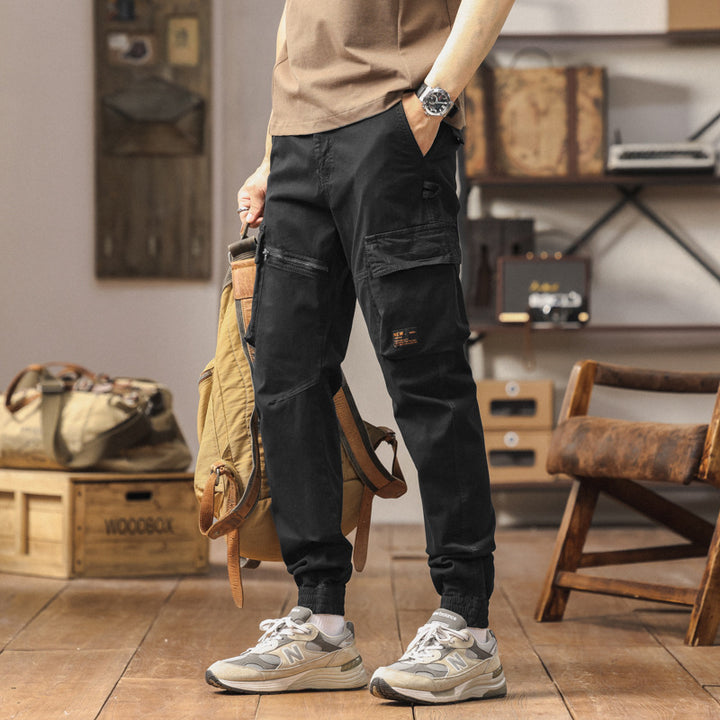 Herren Konisch geschnittene Cargo-Jogginghose mit Mehrfach‑Taschen, Reißverschluss‑Beintasche und elastischem Knöchelabschluss Echo Archiv