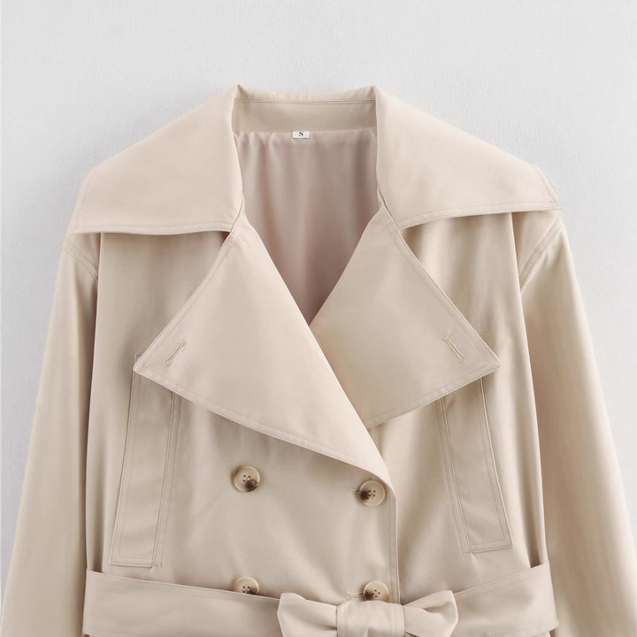 Damen Cropped Trenchjacke mit breitem Revers, Taillengürtel und Doppelknopfreihe Echo Archiv