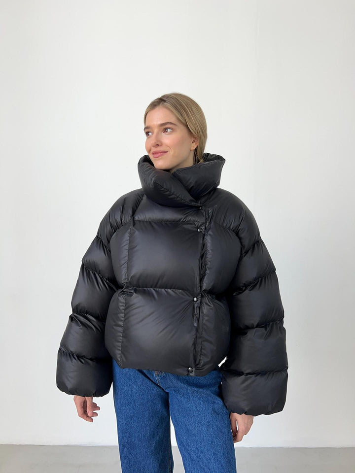 Damen extravagante Oversize Steppdaunenjacke mit extravoluminöser Kapuze Echoarchiv