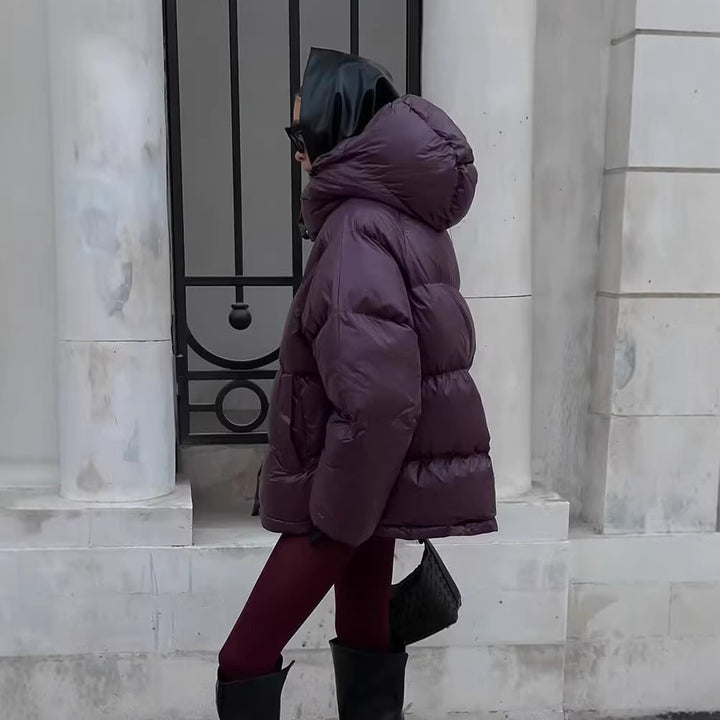 Damen Kurze wattierte Oversize‑Steppjacke mit hohem Stehkragen und Kapuze Echo Archiv