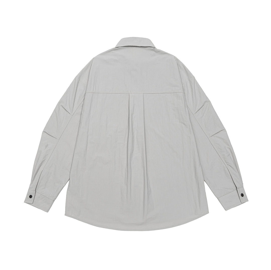 Unisex Leichtes Overshirt im Coach-Stil mit Hemdkragen und Brustprint Echoarchiv