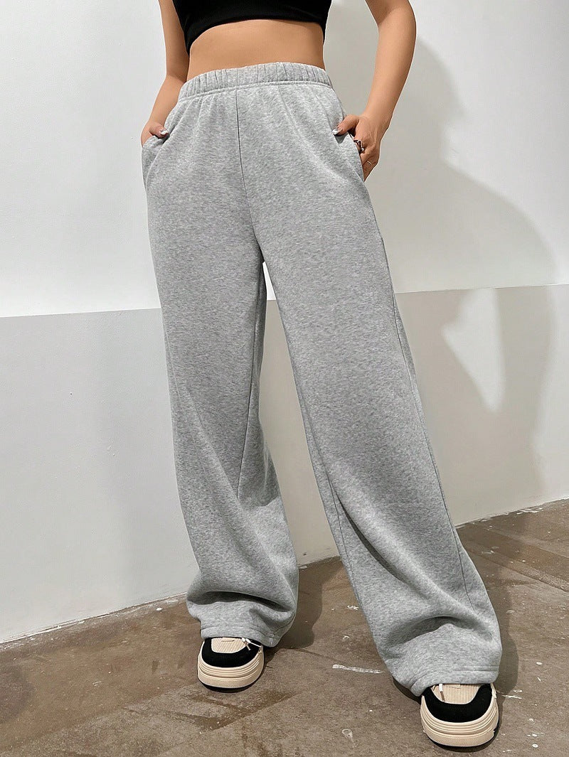 Damen weite Loungehose aus French Terry mit hohem Komfortbund, seitlichen Eingrifftaschen und fließendem Bein – Avélisse