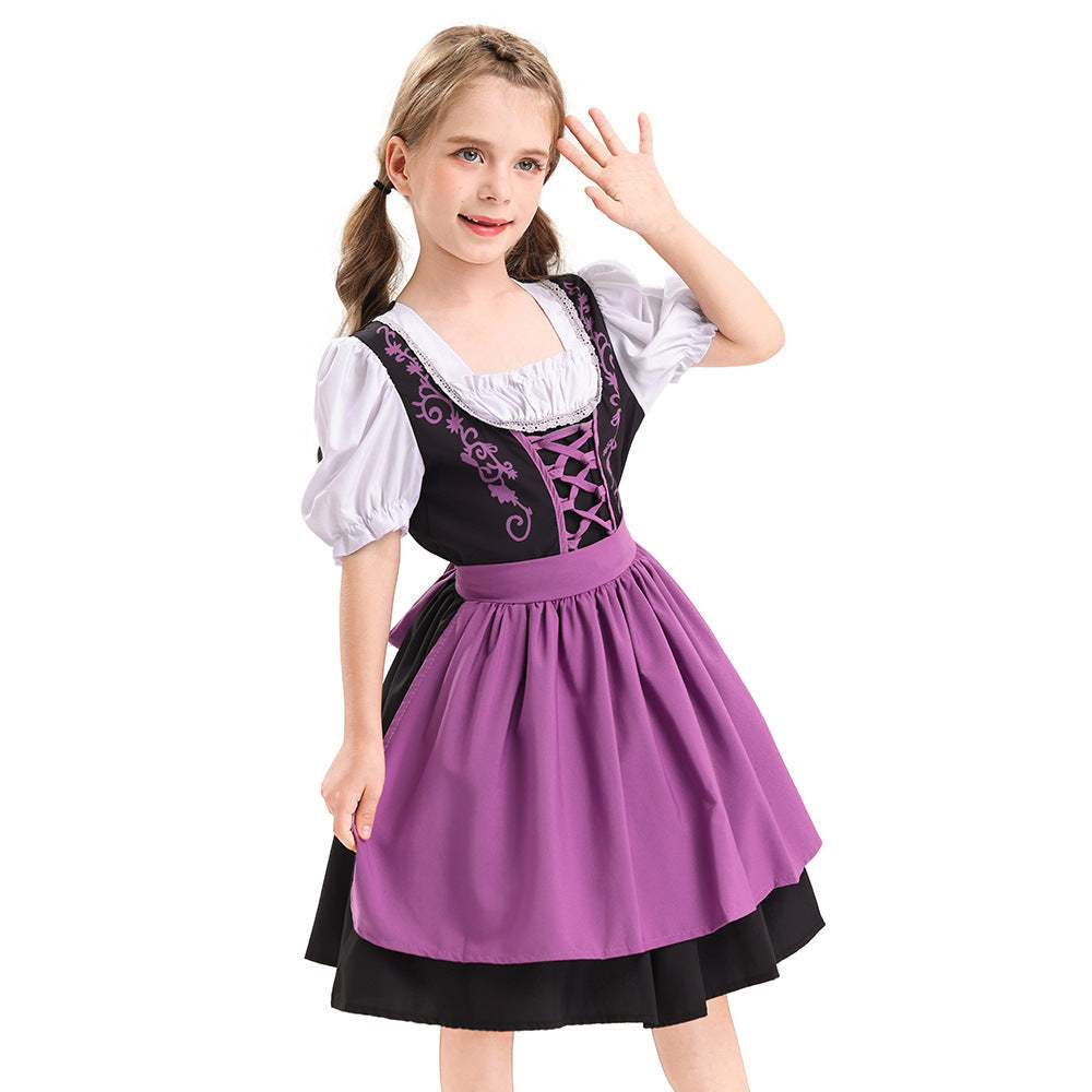 Damen nan traditionelles Kinderdirndl mit geschnürtem Mieder und zweilagiger Schürze Echo Archiv